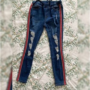 Fun stretchy jeans with red stripe down the legs